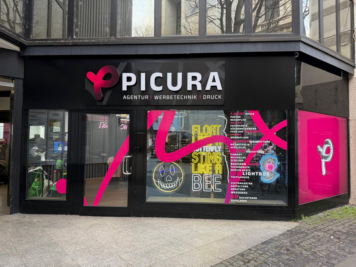 Copyshop Bonn Picura Ladenlokal mit Schaufensterbeschriftung, Neon-Schildern und Druckdienstleistungen