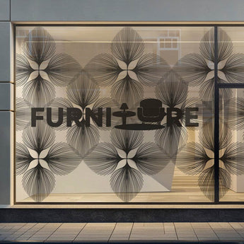 Schaufenster mit floralem Muster und Furniture Schriftzug. Für solche großen Designs können Sie Klebefolie drucken.