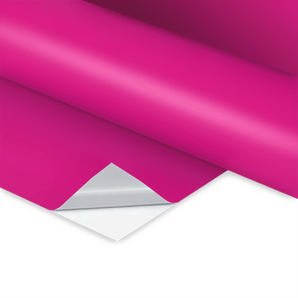 Pinke Folienrolle mit leicht abgezogener Ecke. Ideal, um individuelle und farbenfrohe Klebefolie drucken zu lassen.