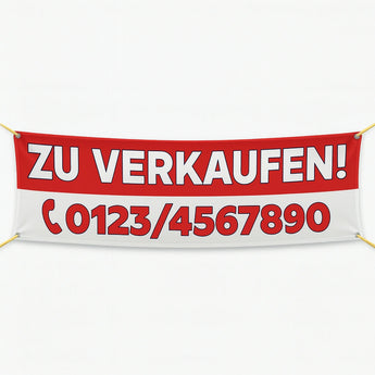 Rot-weißes Werbebanner mit "Zu Verkaufen" und Telefonnummer. Bei uns können Sie auch passende Roll-Up Banner drucken.